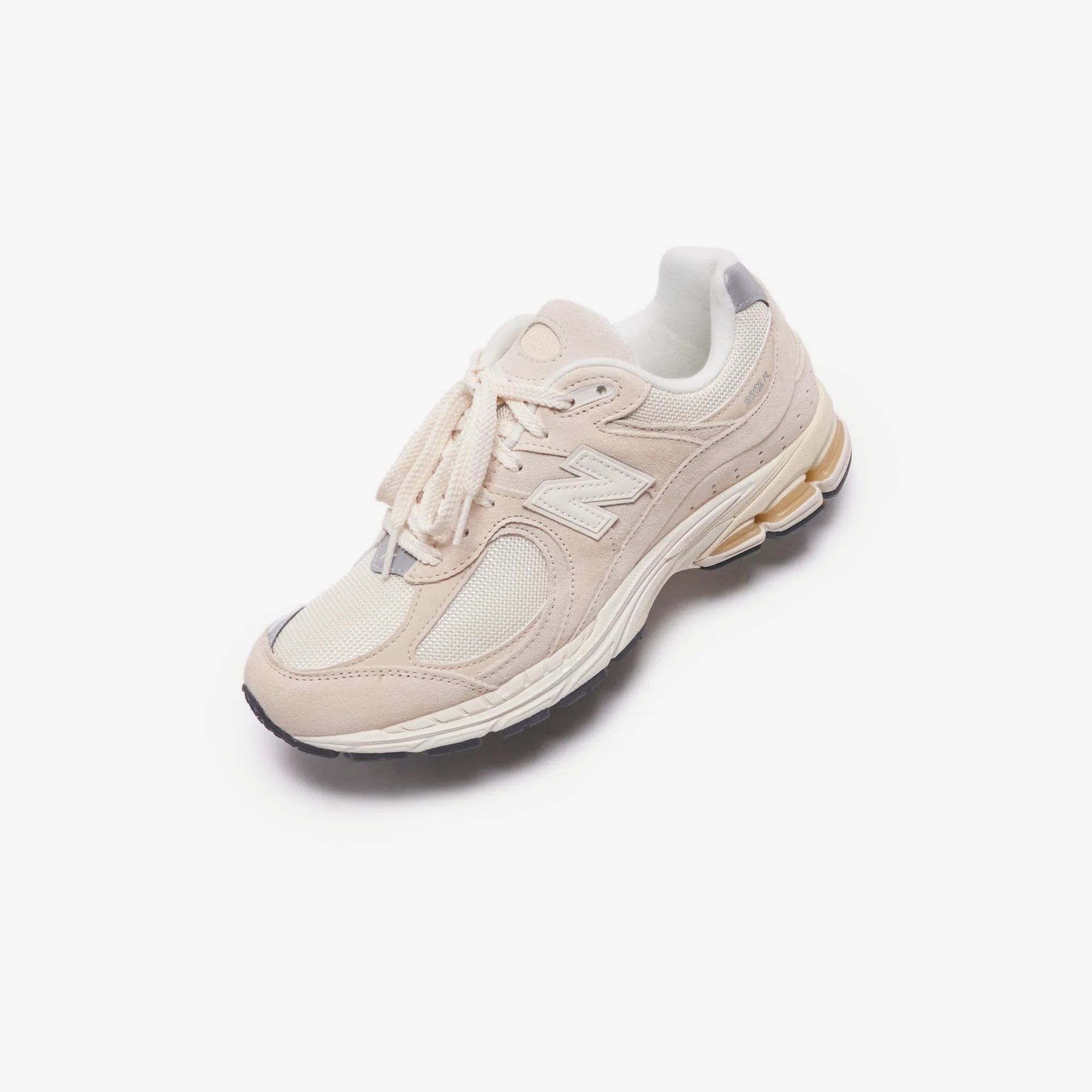 New Balance 2002R - Beruhigendes Taubengrau / Angora / Silber Metallic