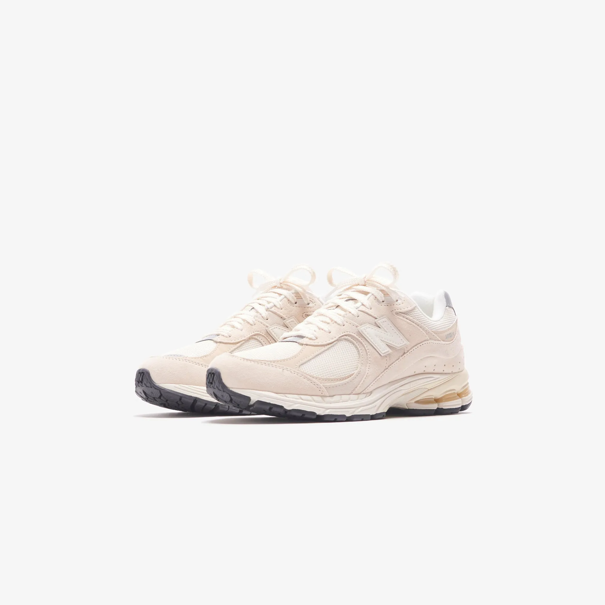 New Balance 2002R - Beruhigendes Taubengrau / Angora / Silber Metallic