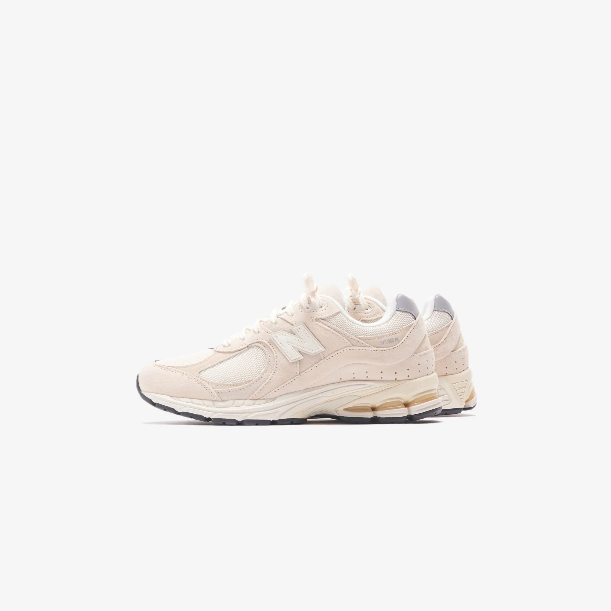 New Balance 2002R - Beruhigendes Taubengrau / Angora / Silber Metallic