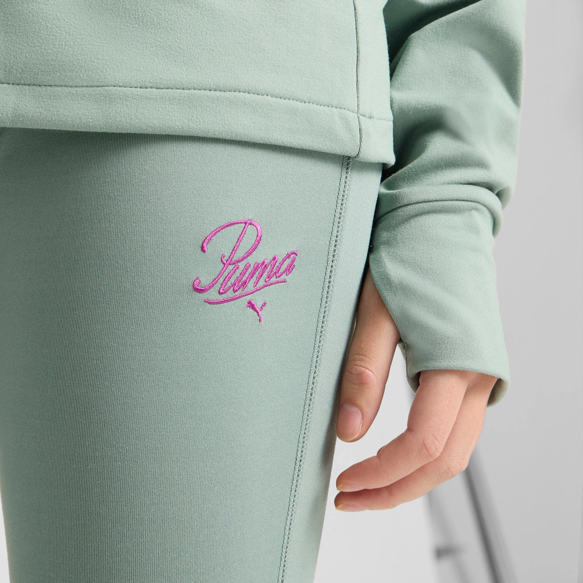 PUMA Damen ESS Script Flared Leggings